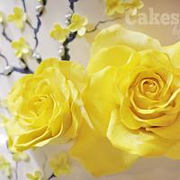 Peony, roses and forsythias wedding cake