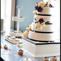 Ivory with touch of blue and purple wedding cake