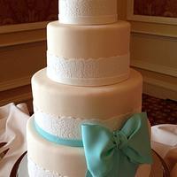 Blue bow vintage wedding cake 