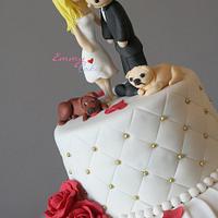 White wedding cake with personalised topper