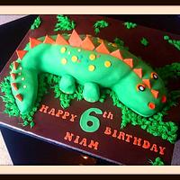 Green dinosaur cake