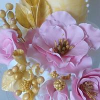 Vintage pink and gold wedding cake