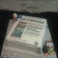Newspaper bundle cake