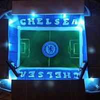 Stamford bridge Chelsea football stadium cake with 'floodlights'