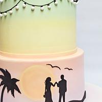 Pastel rainbow silhouette wedding cake