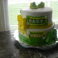 green and yellow baby shower cake