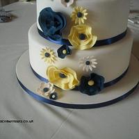Abstract Flowered Navy & Yellow Wedding Cake