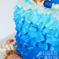 Blue beach wedding cake