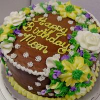 Layer chocolate buttercream cake in floral design