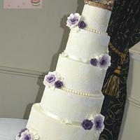 Penguins, lace and roses wedding cake