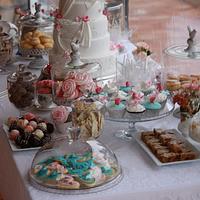 Wedding cake with dessert table