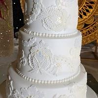a white on white wedding cake