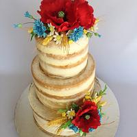 Naked Wedding cake with meadow flowers