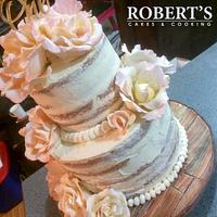 Naked cake with peonies and roses