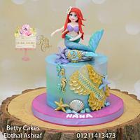 Mermaid and waves in gold Cake