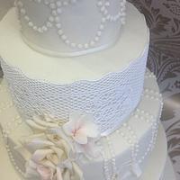 Vintage Inspired lace and pearl wedding cake