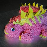 Baby stegosaurus cake