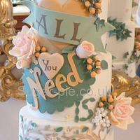 Autumnal 'all you need is love' wedding cake.