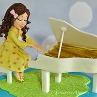 A garden cake for a little pianist.