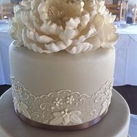 Piped wedding cake with peonie