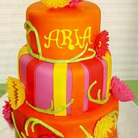 Bright orange and pink babyshower cake