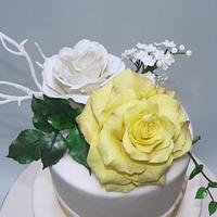 Small wedding cake with yellow rose