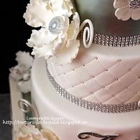 Silver and white wedding cake