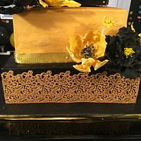 Gold and black theme cake 