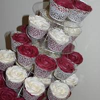 Burgendy wedding cake and rose cupcakes