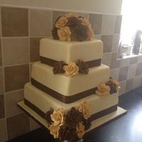 Champagne colour cake with gold & chocolate roses wedding cake 
