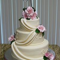 Delicate Beige with pink roses wedding cake