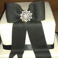black bow wedding cake
