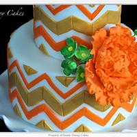Gold and orange chevron cake 