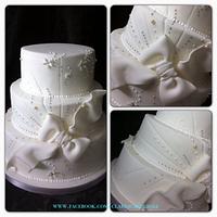 white bow and pearls cake