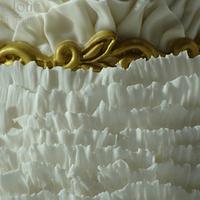 White and Gold Ruffled Wedding Cake