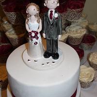 Burgendy wedding cake and rose cupcakes
