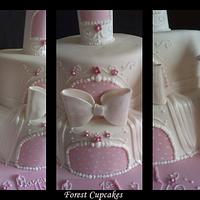Pretty in pink polka dot castle cake