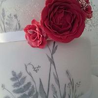 Red and white handpainted wedding cake