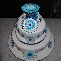 Blue daisy wedding cake