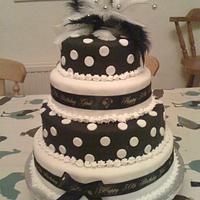 50th Birthday cake with feather cake topper!