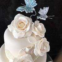Butterflies and roses wedding cake 