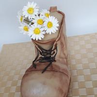 Old shoe with flowers