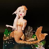 Mermaid in gold...