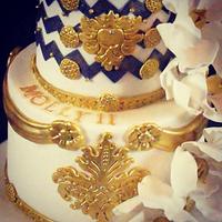 Blue, white and gold birthday cake