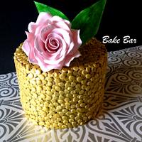 Gold sequin and rose cake