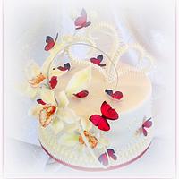 Orchid and butterflies wedding cake