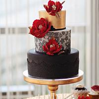 Gold,black and red birthday cake !