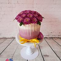 Violet cake with chrysanthemums