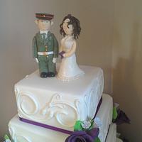 wedding cake with army topper