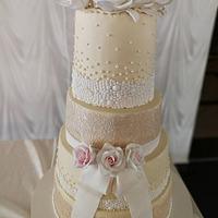 Wedding cake with white roses